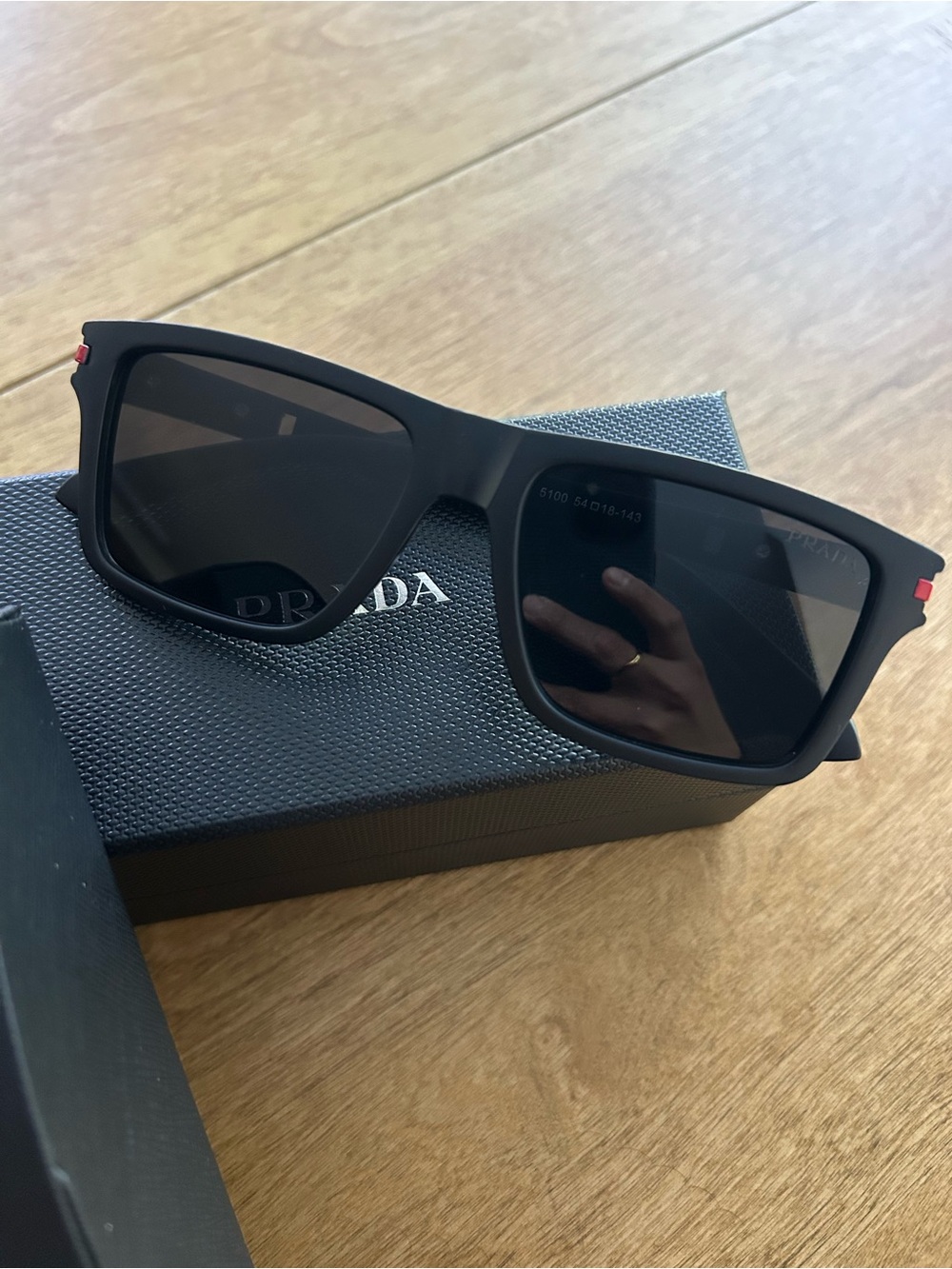 Prada Black Square Sunglasses with Subtle Red Accent - Picture 4 of 4